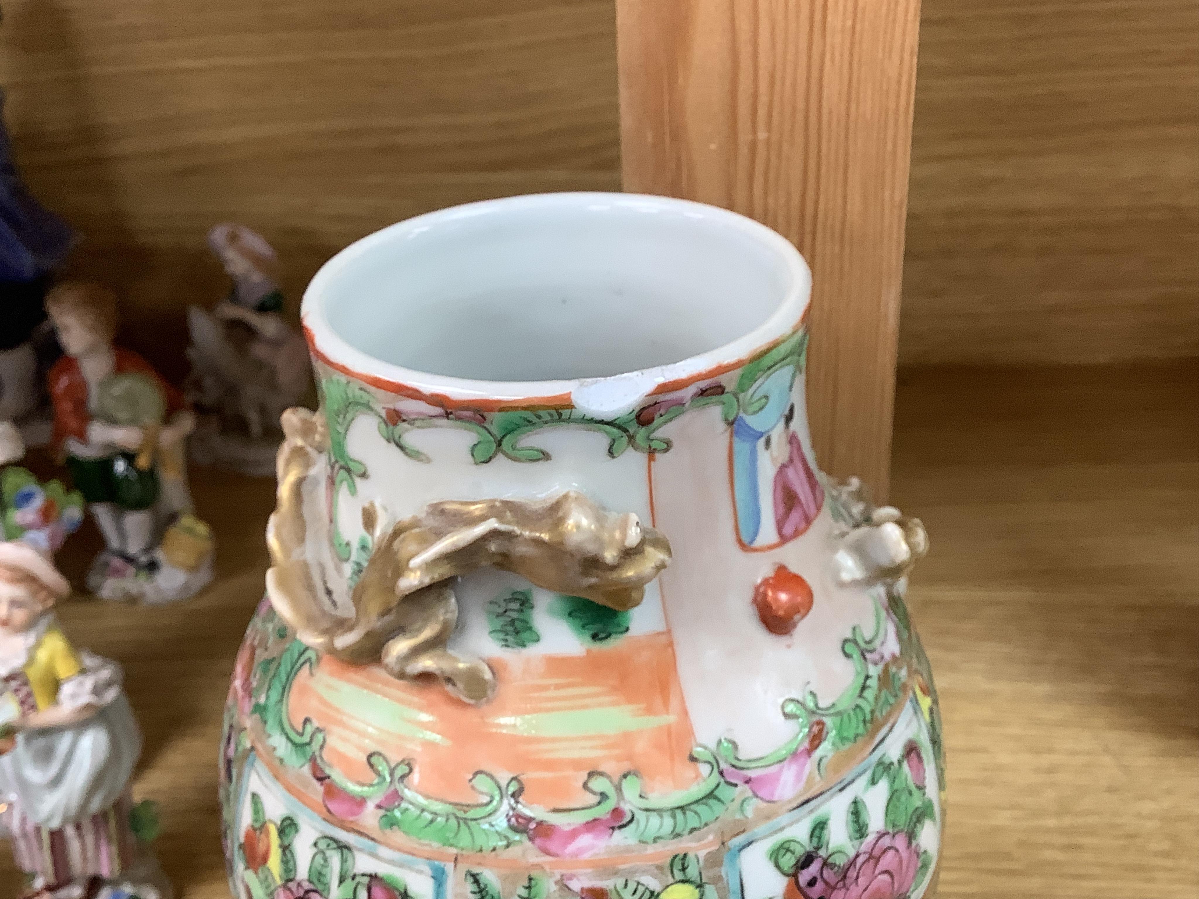 A 19th century Chinese Canton famille rose vase and cover (cover repaired), 28cm high